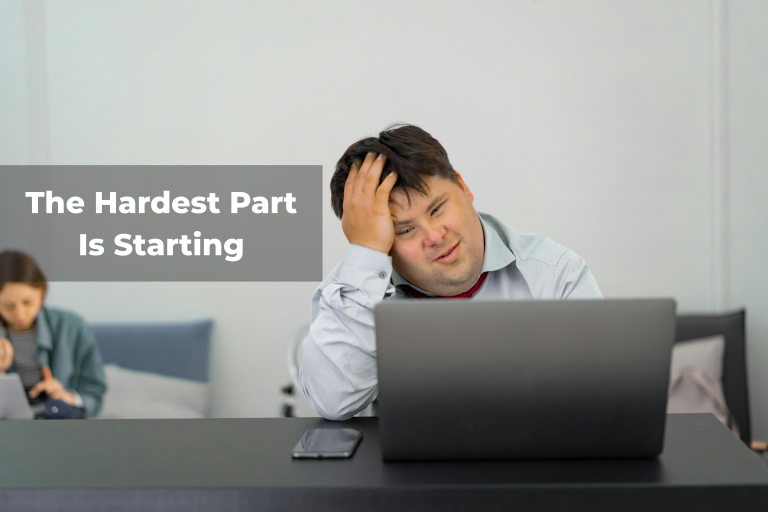 Overwhelmed man staring at laptop screen sinafying that the hardest part is usually starting a project